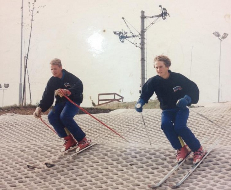 Two skiers on the dry slope