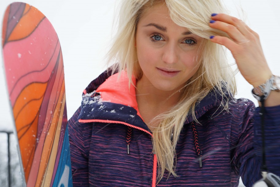 Aimee Fuller posing with snowboard