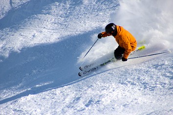 Dan Gillespie Level 3 Ski Instructor demonstrating pole planting while skiing at speed