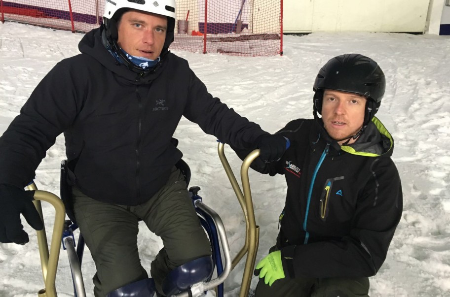 Instructor with disabled skier