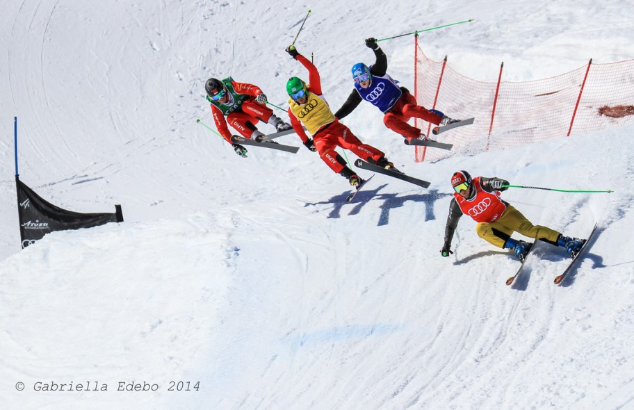 Group of skiers racing on a snowy mountain