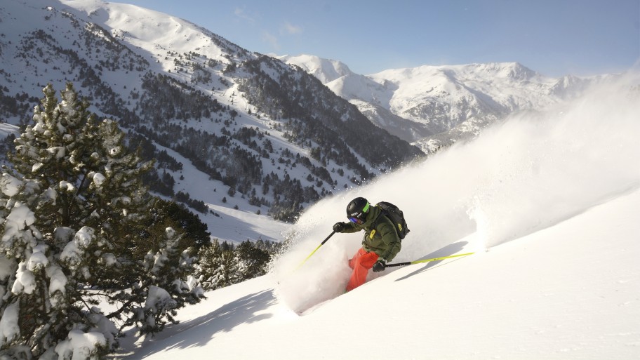 Skier skiing down a run in Andorra