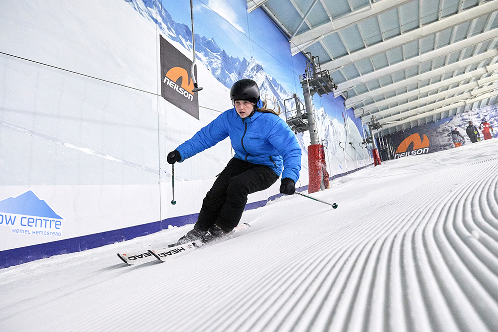 Skier going down slope