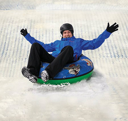 Snow Fun on the ringo slide at the snow centre