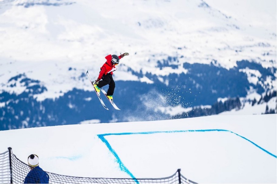 Palmer photographed in the air doing a jump in the mountains