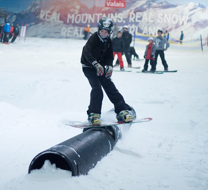 Snowboarder on a bibby