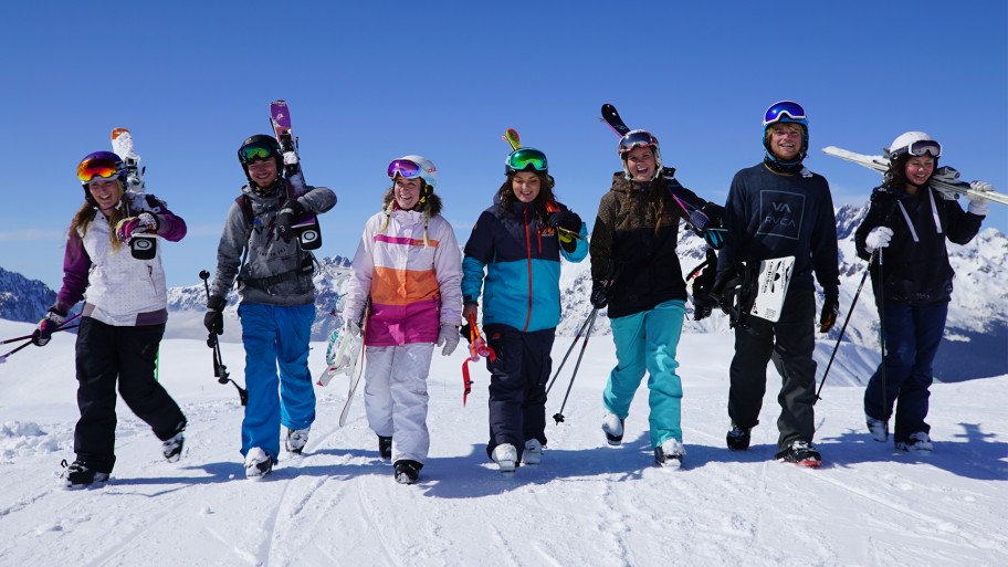 Group of skiers and snowboarders
